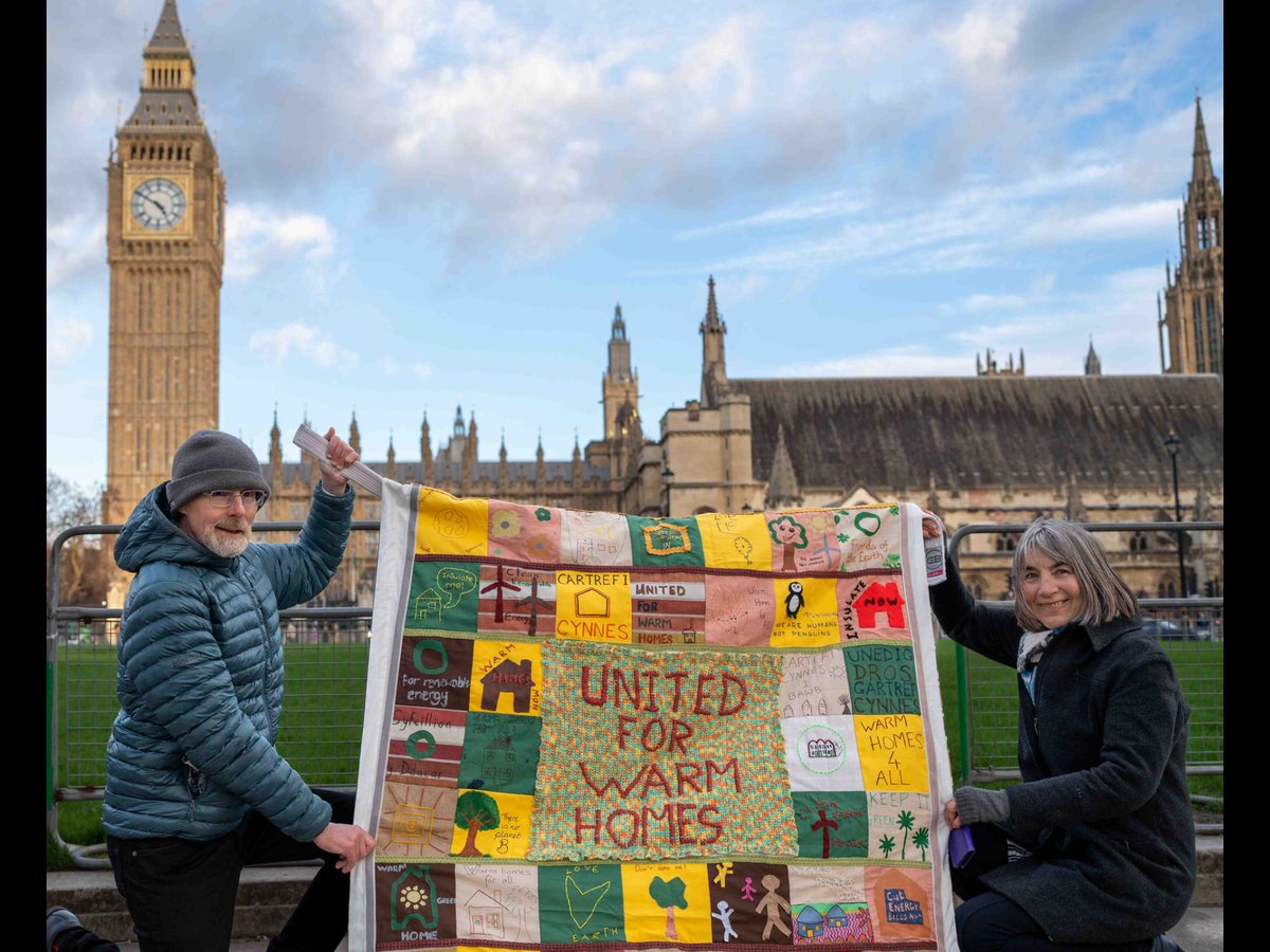 Jenny and Terry with Cardiff FOE's community quilt outside Parliament. FoE held a United for Warm Homes event in Parliament on Mon 26th Feb to launch a new report that highlights the health impacts of cold homes and fuel poverty. An inspiring event. friendsoftheearth.uk/climate/britai…