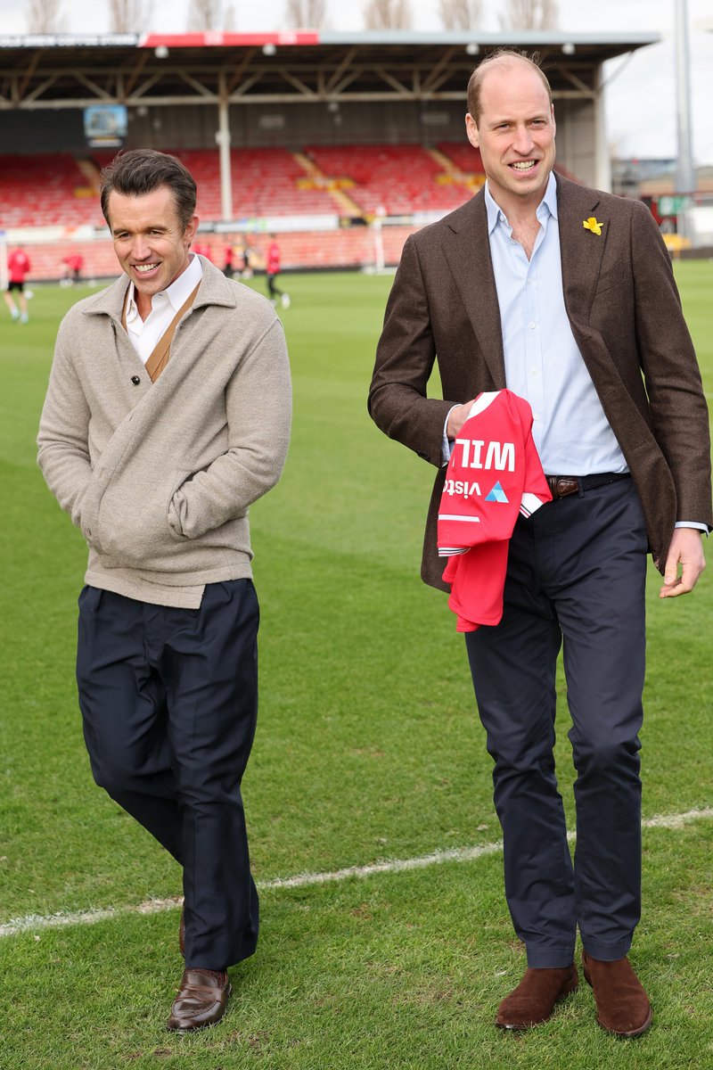 He's an @AVFCOfficial fan Chairman of Wrexham AFC @RMcElhenney and Prince William, Prince of Wales with his personalised Wrexham AFC shirt on the pitch at the Racecourse Ground Pic GETTY