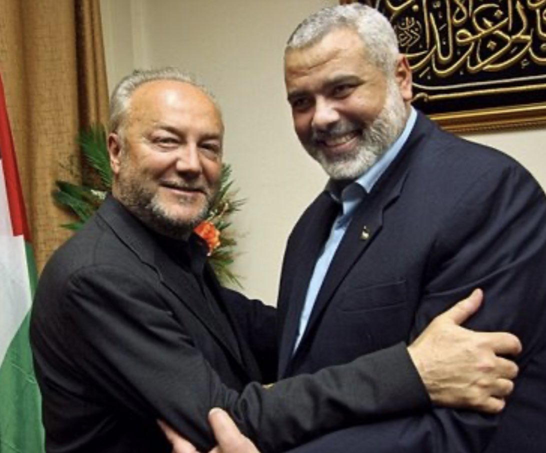 This is a picture of George Galloway embracing Hamas Prime Minister Ismail Haniyeh.