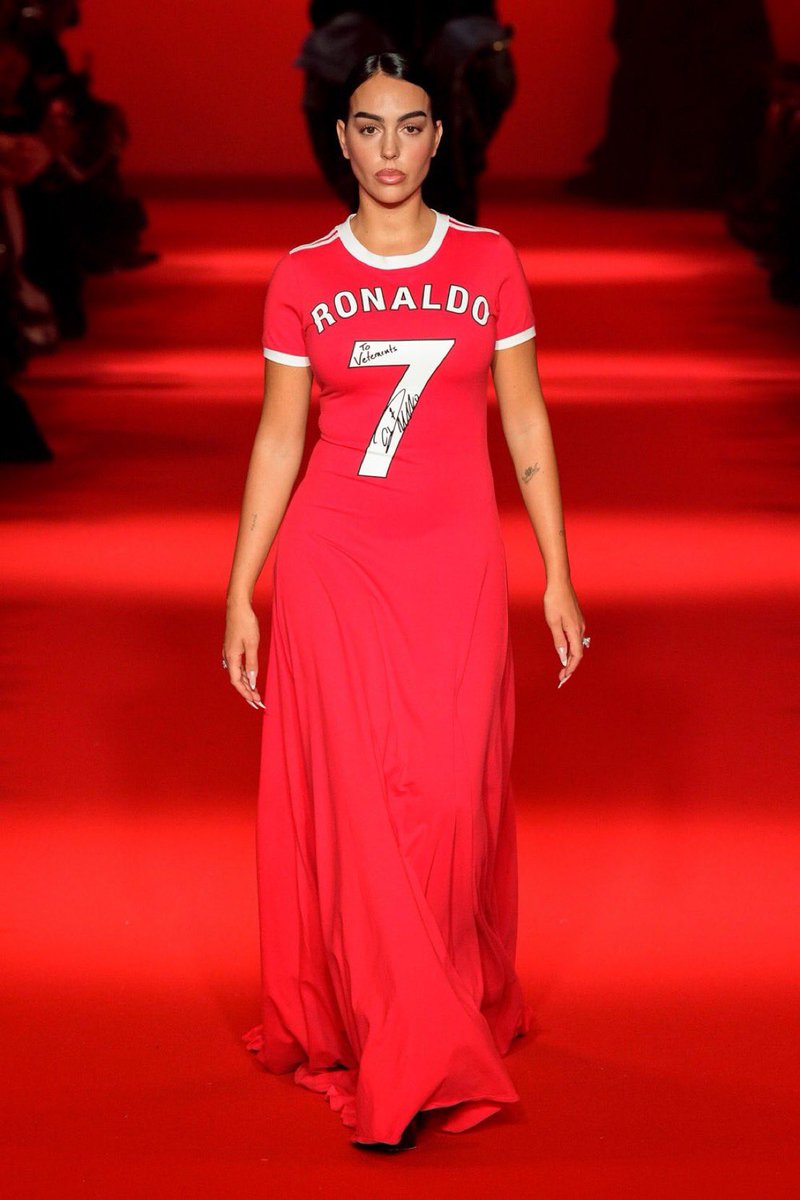 dnstylee's tweet photo. Cristiano Ronaldo’s partner Georgina Rodriguez walks the Vetements show in a Ronaldo jersey dress!! ❤️ https://t.co/oJoubfDI1P
