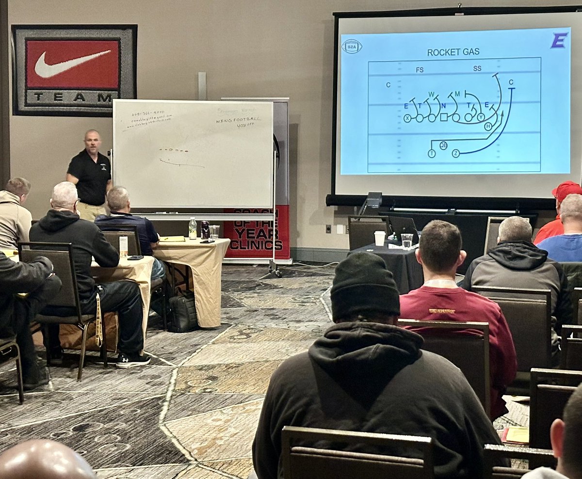 A packed meeting room greeted <a href="/coachhargitt/">Coach Hargitt</a> as he made his first of three presentations today on the DUO Run scheme.  Coaches always happy to listen to Coach Hargitt’s very thorough presentations .  #EmmettHuskiesFB #NENikeClinic #JustDoIt