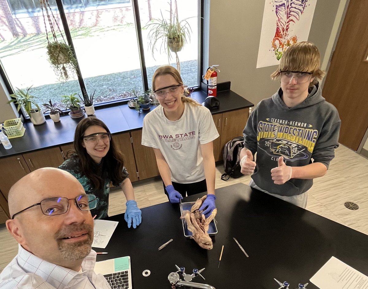 The former science teacher couldn’t resist the Biology dissection unit. #selfiewithapig