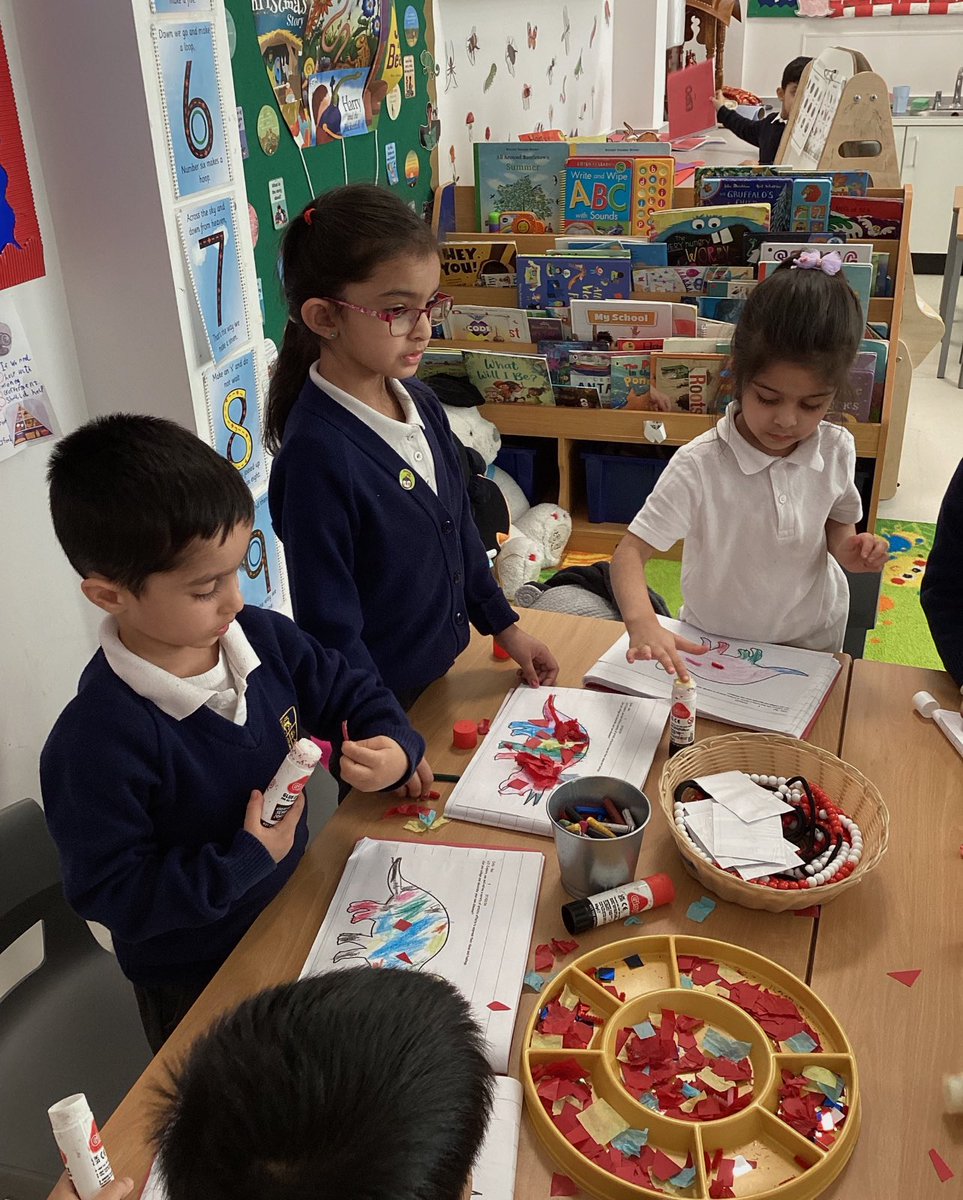 AFSPrimary's tweet image. Reception have learnt a new skill this week; collaging! Look how focused they were when creating some fabulous dinosaur pictures! Which colours would you use to collaging a dinosaur? Why don’t you have a go at home and tweet us back! #afsprimary #expressiveartsanddesign