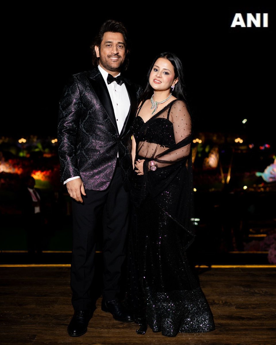 Gujarat | Cricketer Dwayne Bravo, Cricketer Mahendra Singh Dhoni, and his wife Sakshi, pose at the three-day pre-wedding celebrations of Anant Ambani and Radhika Merchant, in Jamnagar.