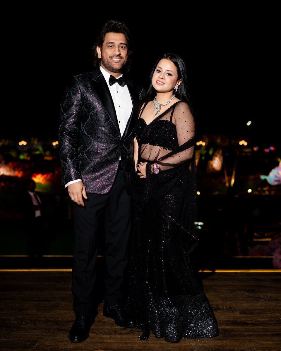 CricCrazyJohns's tweet photo. MS Dhoni &amp; Sakshi during the Pre Wedding of Anant Ambani. 

- Picture of the Day. ❤️ https://t.co/A81036fONe