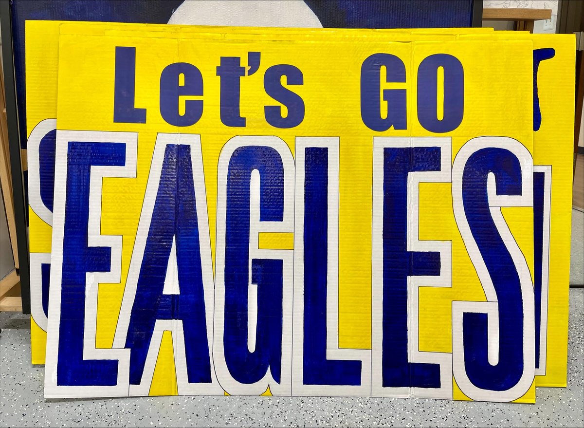 FaithFamilyAcad's tweet photo. 🎨 Our Art Honors students have transformed creativity into spirit! 🦅🏀 Join us in cheering on our Varsity Eagles tonight as they hit the court. These hand-painted signs are a masterpiece of support! Go EAGLES! 💛💙 #WeGotThisFFA #4AUILPlayoffs #3ELVR https://t.co/yC2PThMf6k