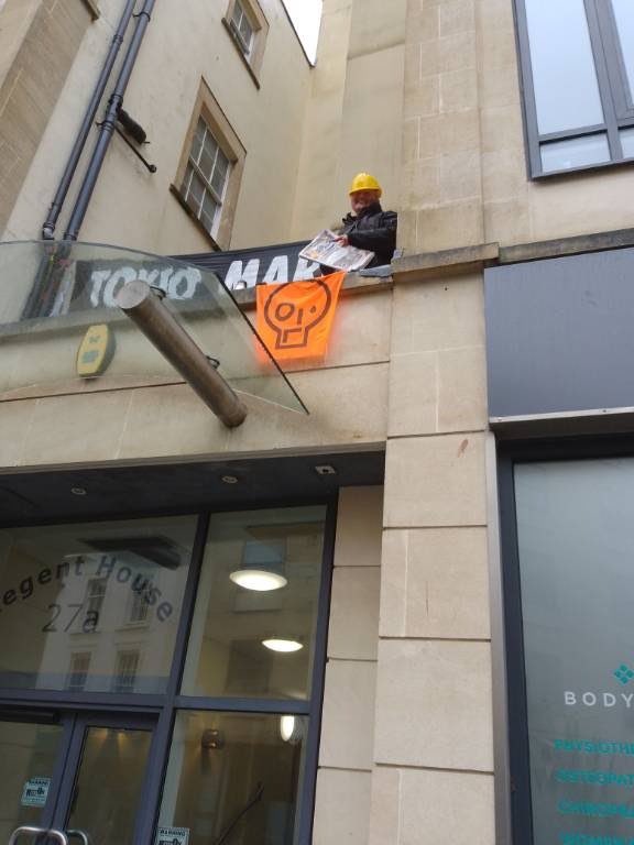 @JustStop_Oil and @XRBristol and @XRebellionUK South West rebels & activists are still occupying the roof of @tokiomarine after a night of rain, hail & cold to demand that TM stop insuring all new oil, gas & coal projects #InsureOurFuture #InsureOurFutureNOW