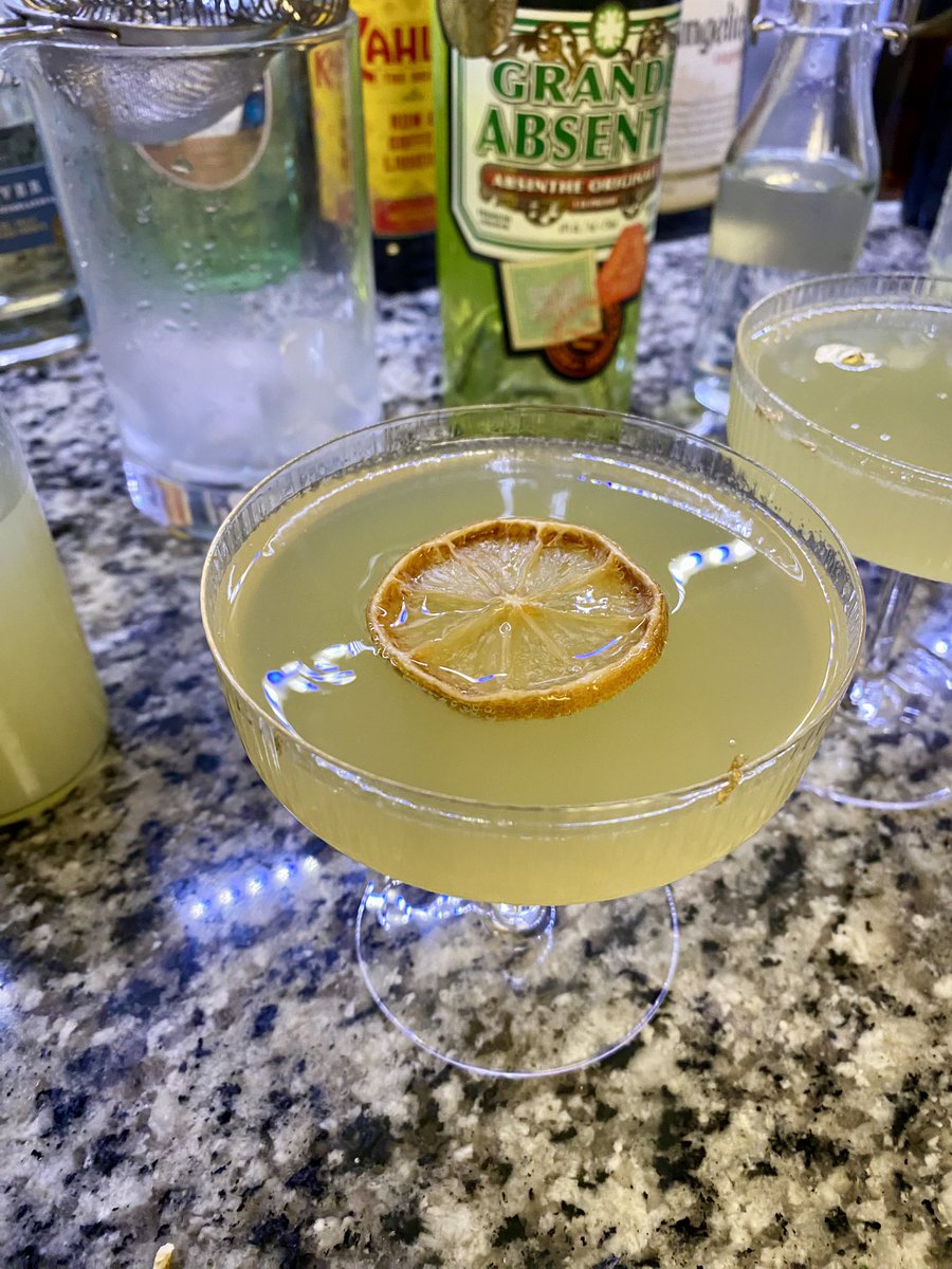 The ‘Logical Elixir’ from our @slipthejabpod 200th episode special. 1 oz Absinthe 1/4 oz simple syrup 1/4 oz lemon juice 1/4 oz lime juice 1/4 oz pineapple juice Top with Champagne Garnish with dehydrated lemon wheel