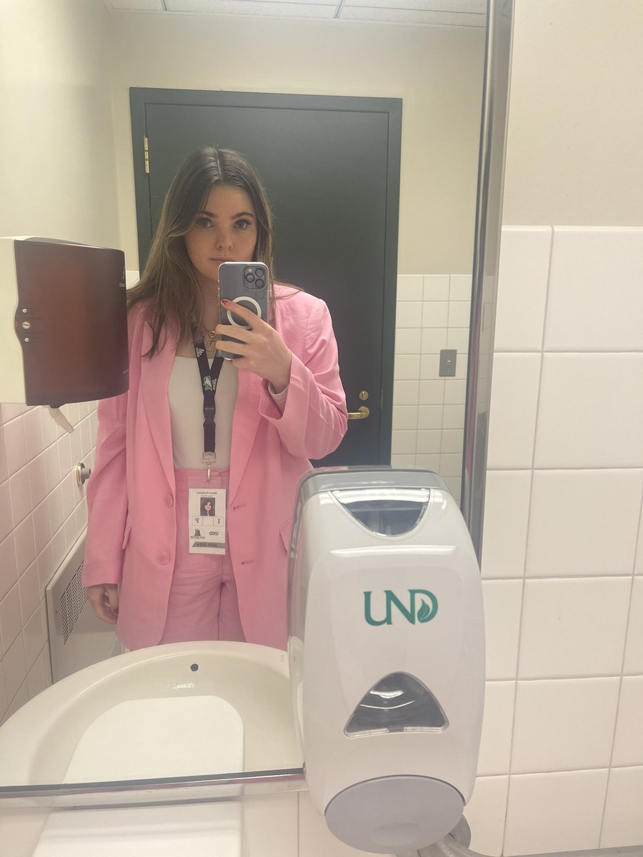 meabh_hushman's tweet photo. Pink pantsuit in the press box to kick off women’s history month 

featuring my favorite equipment manager 🥰 https://t.co/lLGVZBxQOl