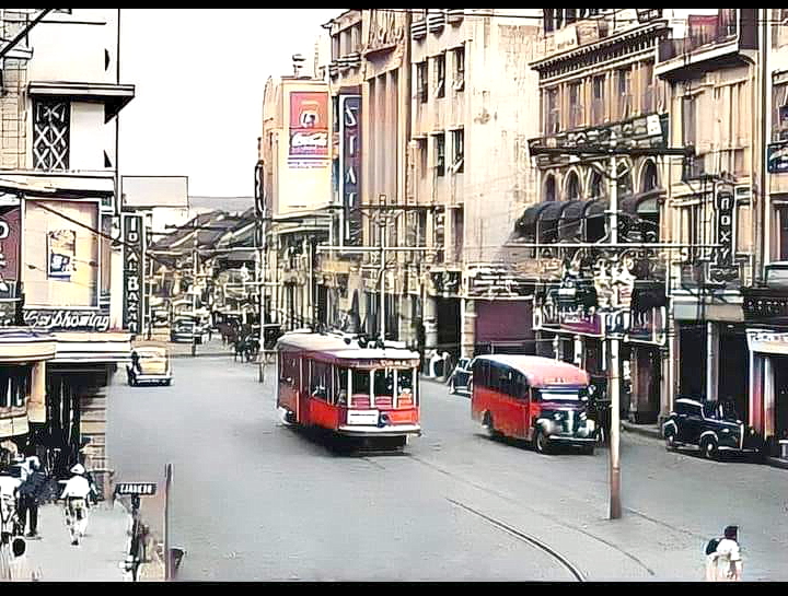 PRE-WAR AVENIDA RIZAL
Manila, Philippines

An undated, colorized photo showing a bustling Avenida Rizal in the 1930s. The photo, shot from a perspective on Carriedo Street in Sta. Cruz, looking northward, includes a tranvia, Ideal Bazaar, and the State Theater. 

#UrbanHistory