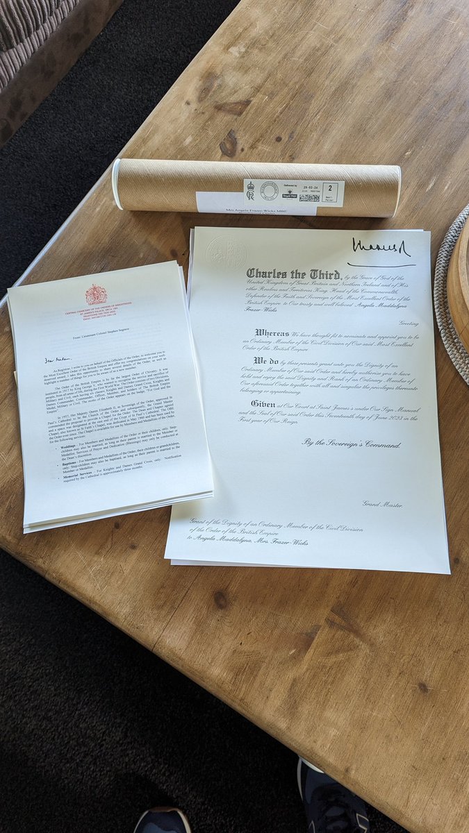 Postman delivered a cardboard tube - I assumed my kid had ordered another poster for her room. Turned out to be a signed scroll from the King 👑😱 and a letter welcoming me to the Most Excellent Order of the British Empire!! #mylifegetsmorebonkersbytheday