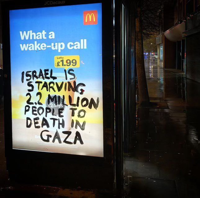 🇵🇸 A striking message on a McDonald's advertisement board reads:

'Israel is starving 2.2 million Gazans in a lethal siege.' #EndGazaBlockade #SaveGaza #StopTheSiege