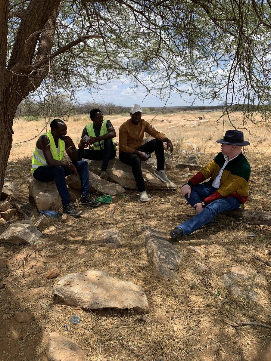 SpokespersonGoK's tweet photo. The Isiolo- Samburu Fibre Optic cable is currently being constructed. The Government Spokesman Hon Sen (Dr.) Isaac Mwaura CBS was privileged to interact with the young people who are working on the line at Soit Oltinga, Near Wau, in Samburu County. The project is being undertaken by the ICT Authority. 

Hearing their heartwarming stories, on how the rolling out of the 100,000 Kilometer digital superhighway is transforming their lives, clearly there is impact on the ground. 

Esther Kasau from Mwingi is a food vendor at the site and is happy that for the last 7 months, the mother of two has been able to take her two children to school. 

Wanjala from Navakholo, in Kakamega, has bought a cow out of the proceeds of this fibre jobs, while his friend from Ruiru wataalam has been able to get a sewing machine for school sweaters. 
These ductlines are not just running beneath us, to open up digitally locked places to the world, but they are helping hustlers to build their assets one at a time from the bottom up! 
#DigitalSupperHighway 
#FaibaInatujenga
#GoKDelivers