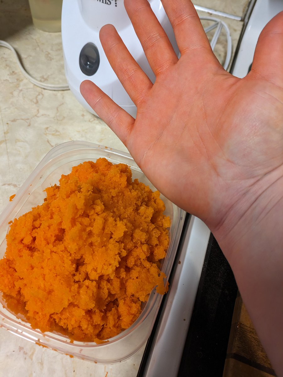 I am making a test cake for Babs' first birthday. It's carrot and after finally shredding a pound of carrots, I am turning into an oompa loompa.