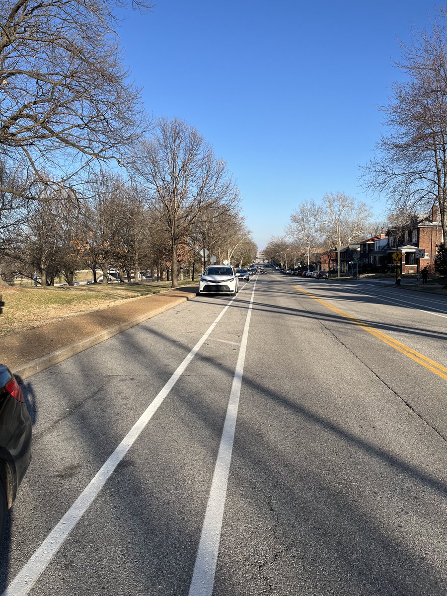1984Chet's tweet photo. Poor cyclist navigating Oakland today with all the cars parked in his bike lane. But, it was not remarked a bike lane &amp; “no parking” signs not reinstalled after sewer project. Please address b4 someone gets injured. ⁦@stlcsb⁩ ⁦@STL4Ward⁩ ⁦⁦@ScottOgilvieSTL⁩ https://t.co/MxSlmUpKTU