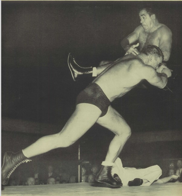 Leo Nomellini nails defending NWA World Champ Lou Thesz during their June 16, 1953 bout on the first San Francisco Cow Palace wrestling card.