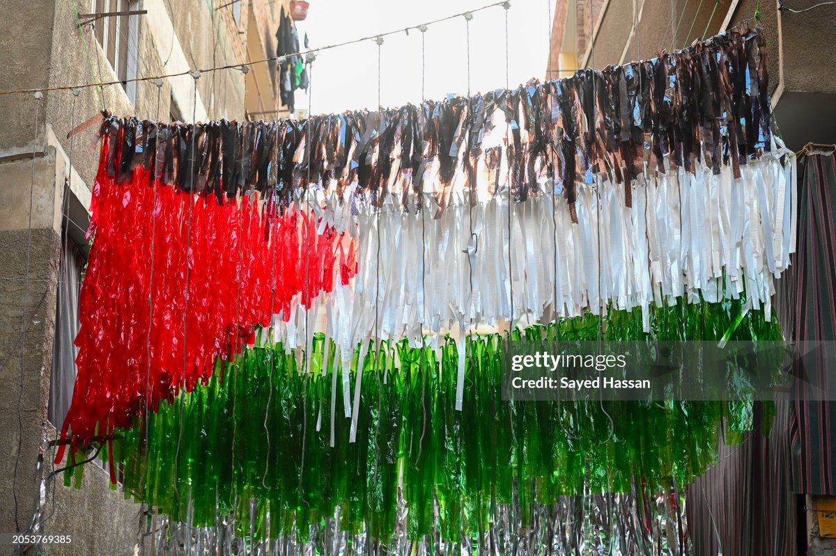 sayedhassan1207's tweet photo. A residential street in Giza is decorated in preparation for the holy month of Ramadan with the flag of Palestine on March 2, 2024 in Giza, Egypt.  (Photo by Sayed Hassan/ @GettyImages) https://t.co/VEGCiKplPj