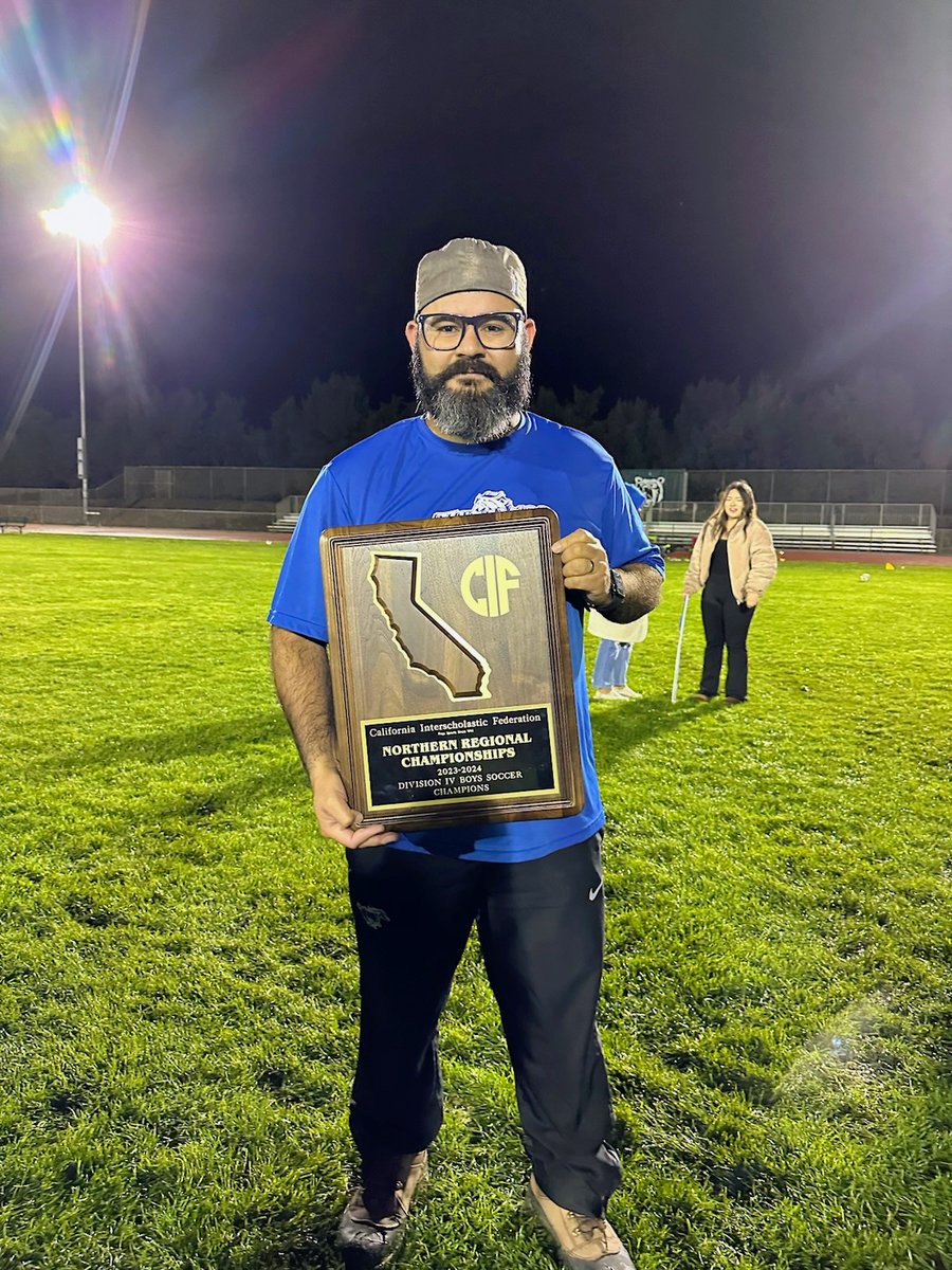 King City coach Jaime Cortes holds his second Nor Cal DIV boys soccer title