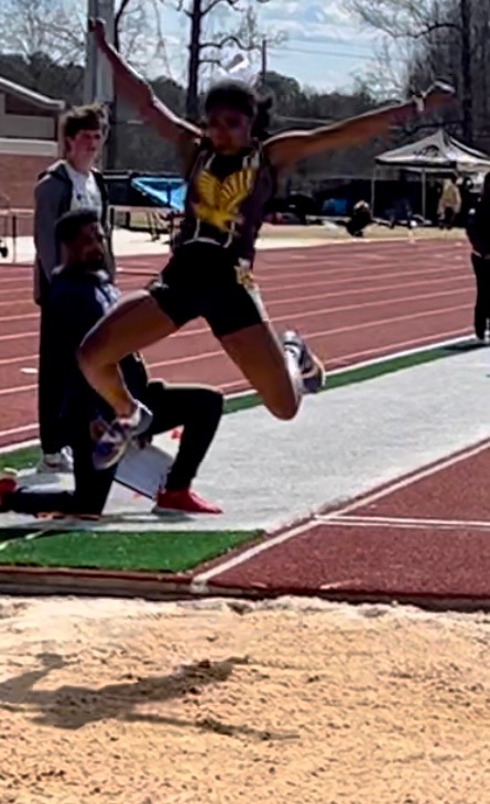 EagleAthletics's tweet photo. If you haven't meet the # 1 Highschool long jumper in the nation, then let me introduce you to Eagle's Landing own Mary Rozier. Congratulations, Mary, on a job well done.  Eagle nation is very proud of you. #EagleStong...all day long! https://t.co/yD2ARQdxhb