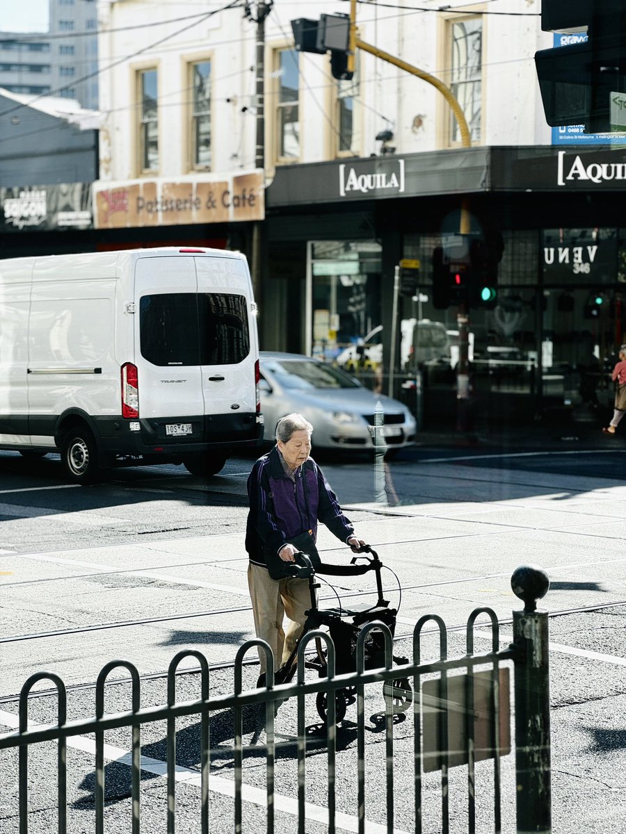 RSaprative's tweet photo. Living in Melbourne has made one thing very clear for me though, this city is very aesthetic. Got this picture of an old lady crossing the busy streets of “chapel street” earlier this thursday.

Shot on iPhone 15 Pro edited on default apple photos edit. https://t.co/wf1ZFBmIMi