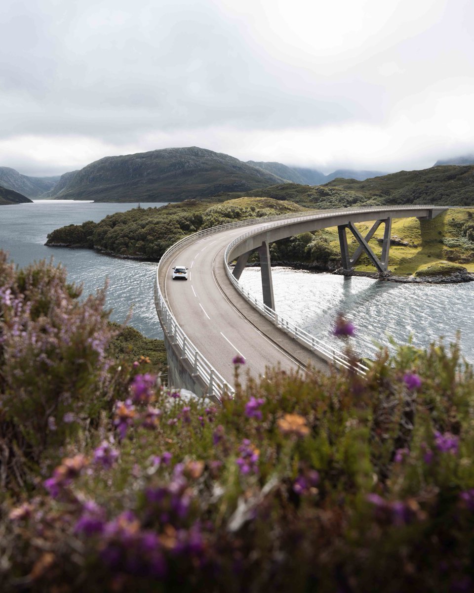 Crossing into adventure at Kylesku Bridge along the #NC500! 🌉 This iconic landmark spans the stunning waters of Loch a' Chairn Bhain, offering breathtaking views and unforgettable photo opportunities. Have you crossed the bridge yet? #NorthCoast500 #Kylesku