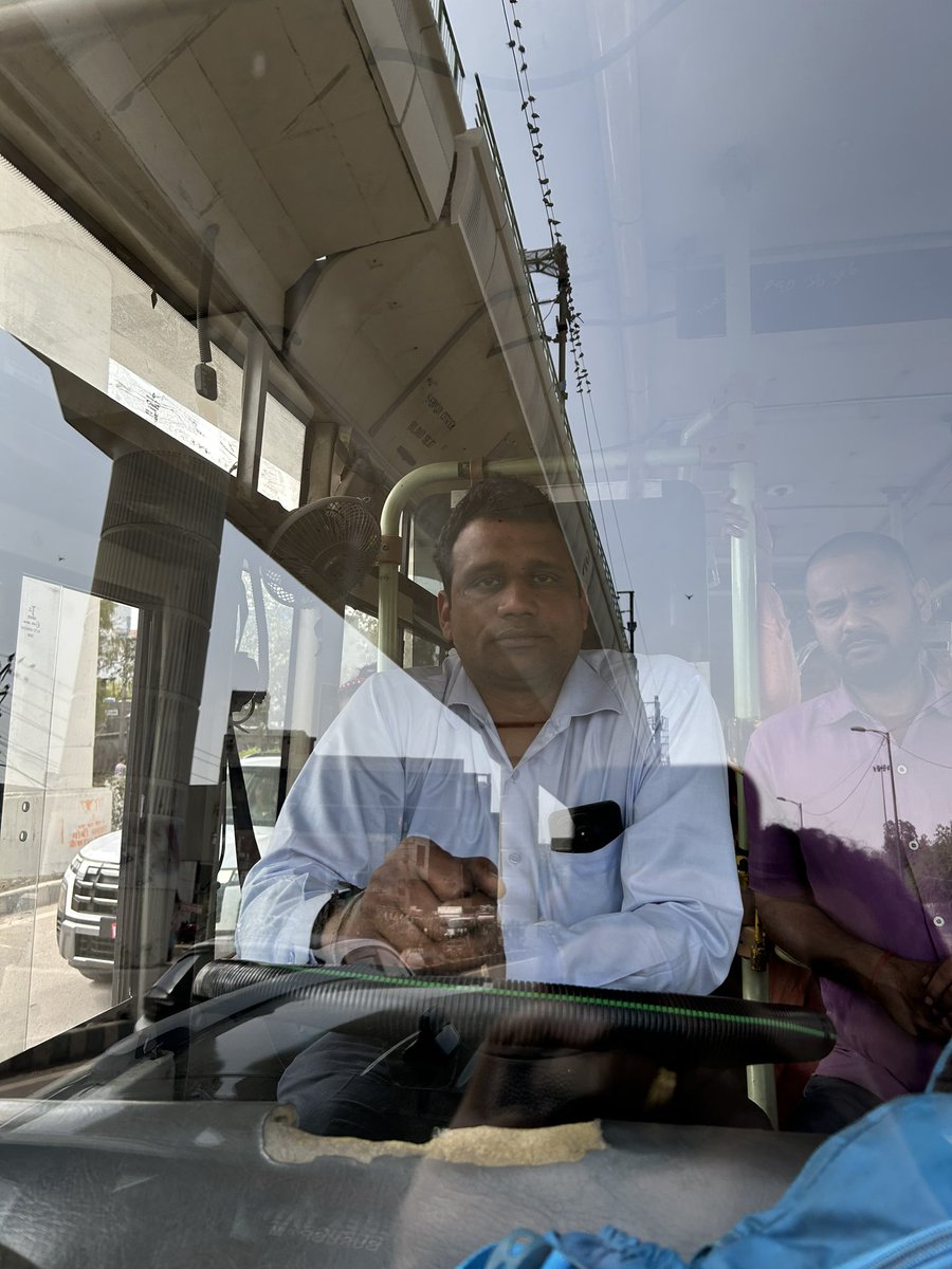 Agupta90's tweet photo. This gentleman from DTC is neither driving nor stopping the bus in the bus lane. Just spared from accident because driver stopped in the middle of the road all of a sudden. @dtptraffic @kgahlot @ArvindKejriwal @dtchq_delhi Please guide and train them for road safety. https://t.co/QqY2dshjwR