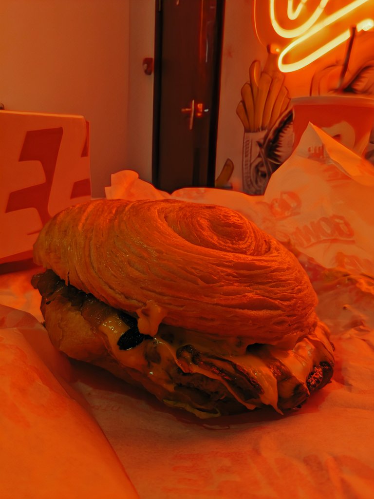 Oowee's croissant burger had a smashed beef patty, funkier &amp; beefier than I was anticipating, cloaked in melted American cheese and grilled onions, necessary slaps of umami against the layered bun, not quite Fat Dad's glazed doughnut level of sweetness but a step up from brioche.