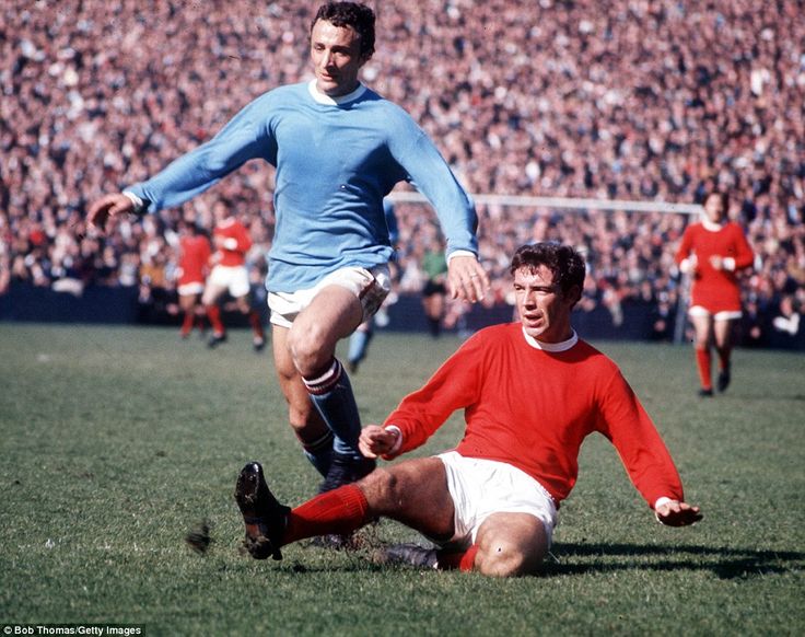 Ahead of the Derby today, here's a cracking photo of Utds David Sadler sliding in on Citys Mike Summerbee #mufc
