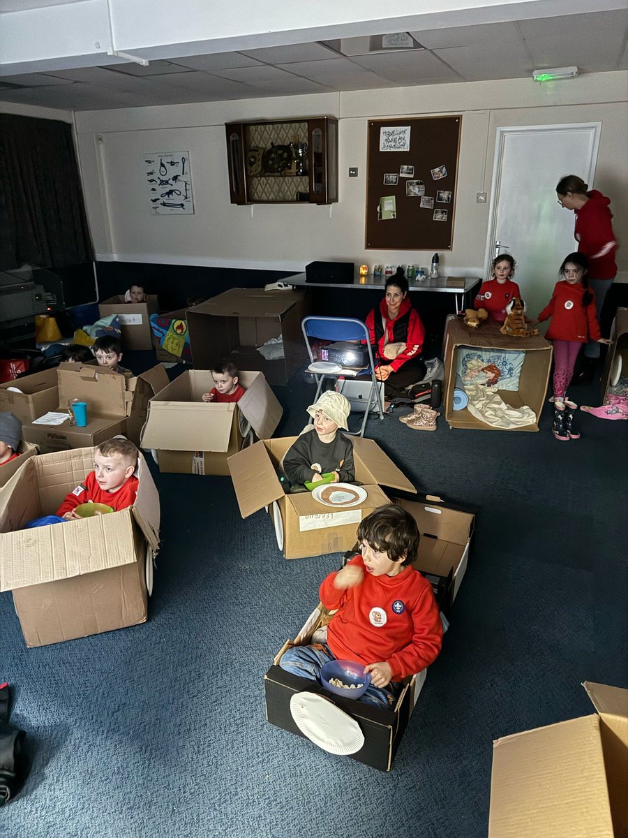 Congratulations to 1st Knaphill Squirrels completing their first night away in Scouts with a drive in movie themed sleepover. With their cars made they settled down to watch the film & eat pizza. In an interval they went outside to toast marshmallows & make popcorn over the fire!
