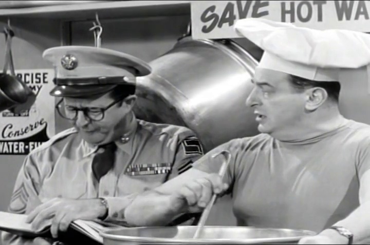'Colonel tricks Bilko with reverse psychology to avoid marching, curious about his illness. Maneuvers and countryside joys are not for him.' #MilitaryMischief #ReversePsychology [From The Phil Silvers Show, Ep: 'Bivouac,' (Tue, Nov 29, 1955)]