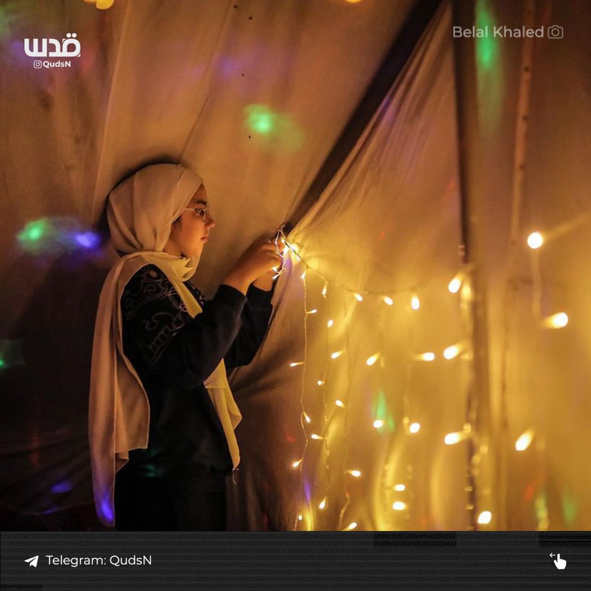 A displaced Palestinian family in Rafah decorates its tent with lanterns and decorations in anticipation of Ramadan to bring joy for the children and mitigate the effects of war.