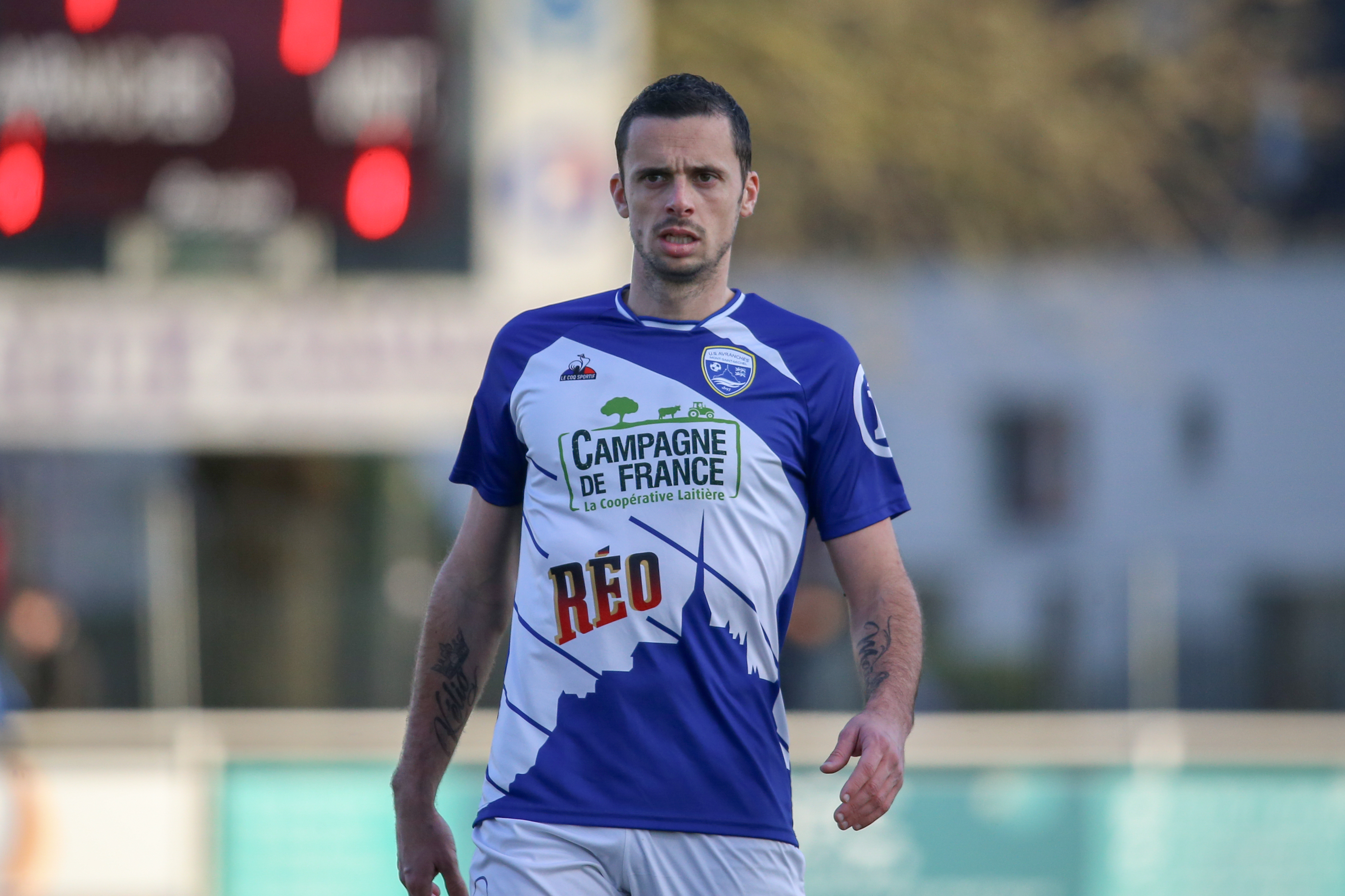 Le coq top sportif grandville normandie