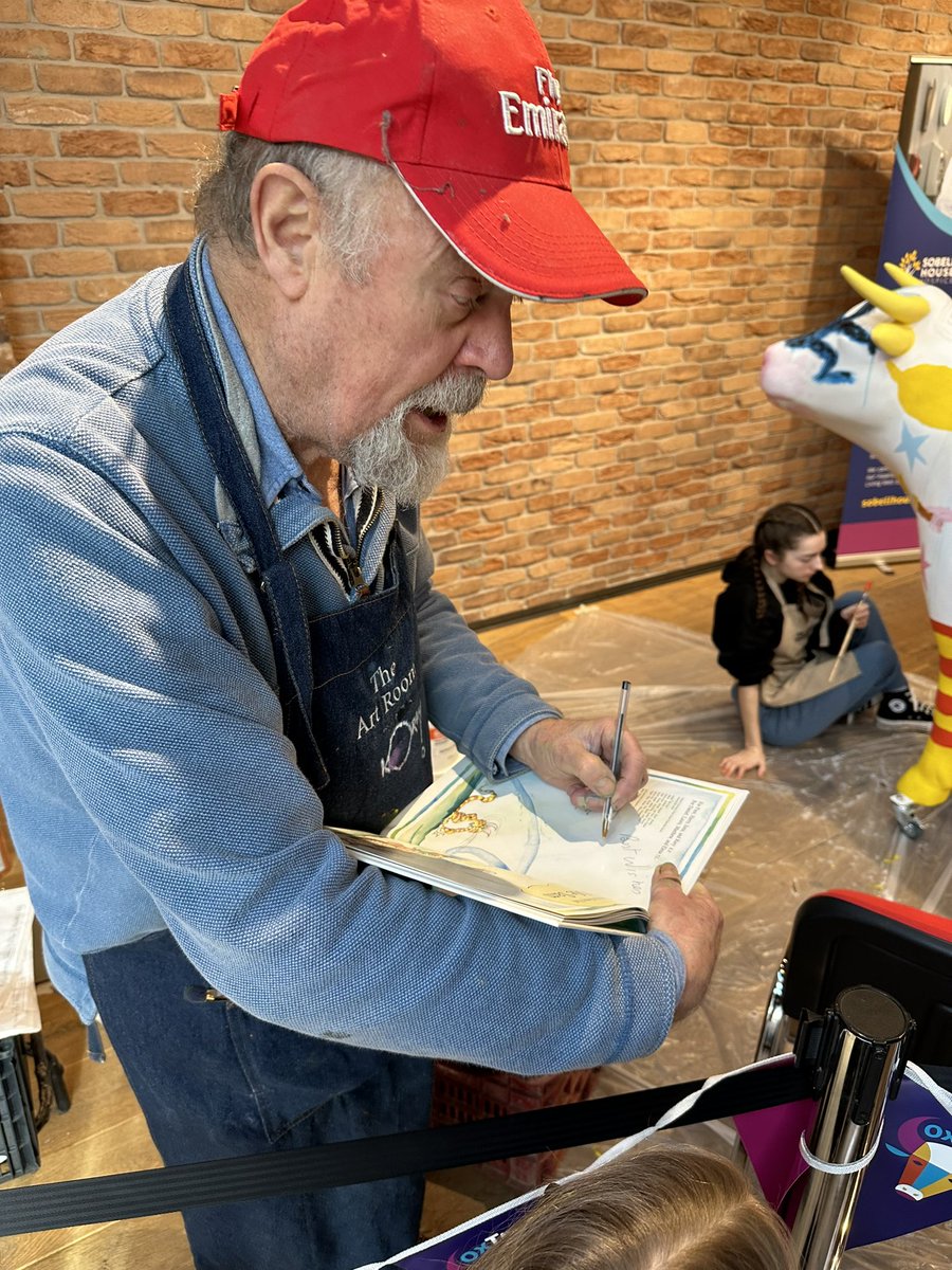 BexEmptage's tweet photo. Meeting the illustrator of the Winnie &amp; Wilbur books @korkypaul painting Ox’s for @sobellhouse ❤️ got us a signed book for a £5 donation https://t.co/g7HQa4o508