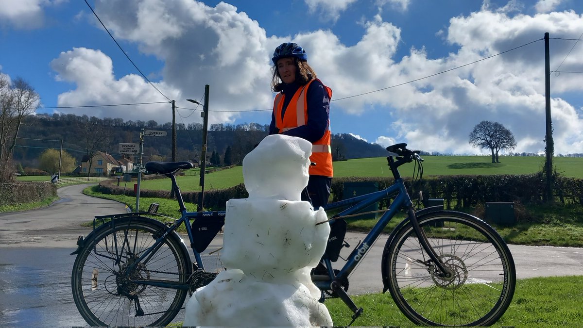 It's lovely and sunny here in Gloucestershire today.  This snowman is holding on though.