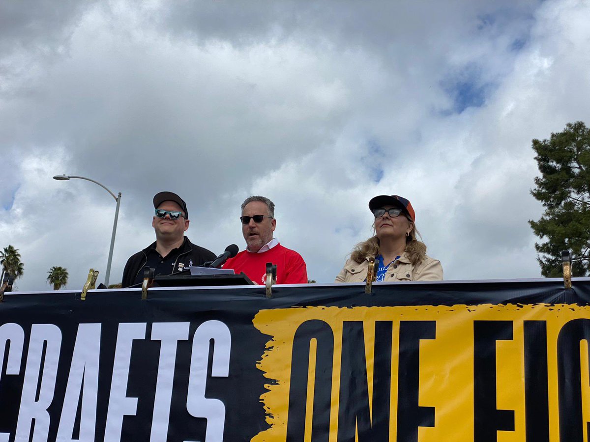 SAG-AFTRA national executive director Duncan Crabtree-Ireland, DGA national executive director Russell Hollander, and WGAW VP Michele Mulroney at today’s Many Crafts One Fight rally (📸 Katie Campione/Deadline)