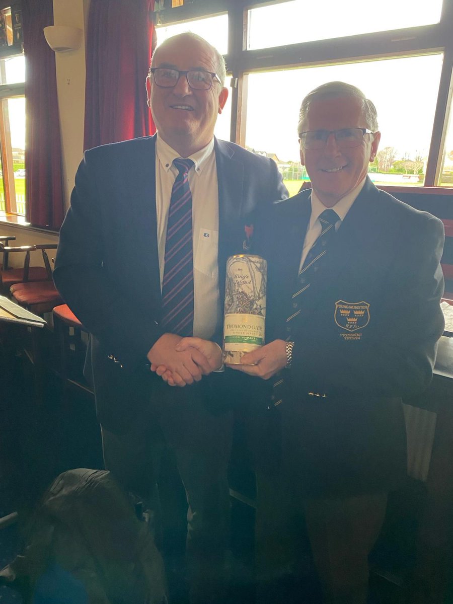 Mick Moore presenting a bottle of Thomondgate Whiskey to Mick Fitzsimons President Clontarf FC prior to Saturday’s game <a href="/ThomondGW/">Thomond Gate Limerick Whiskey</a>