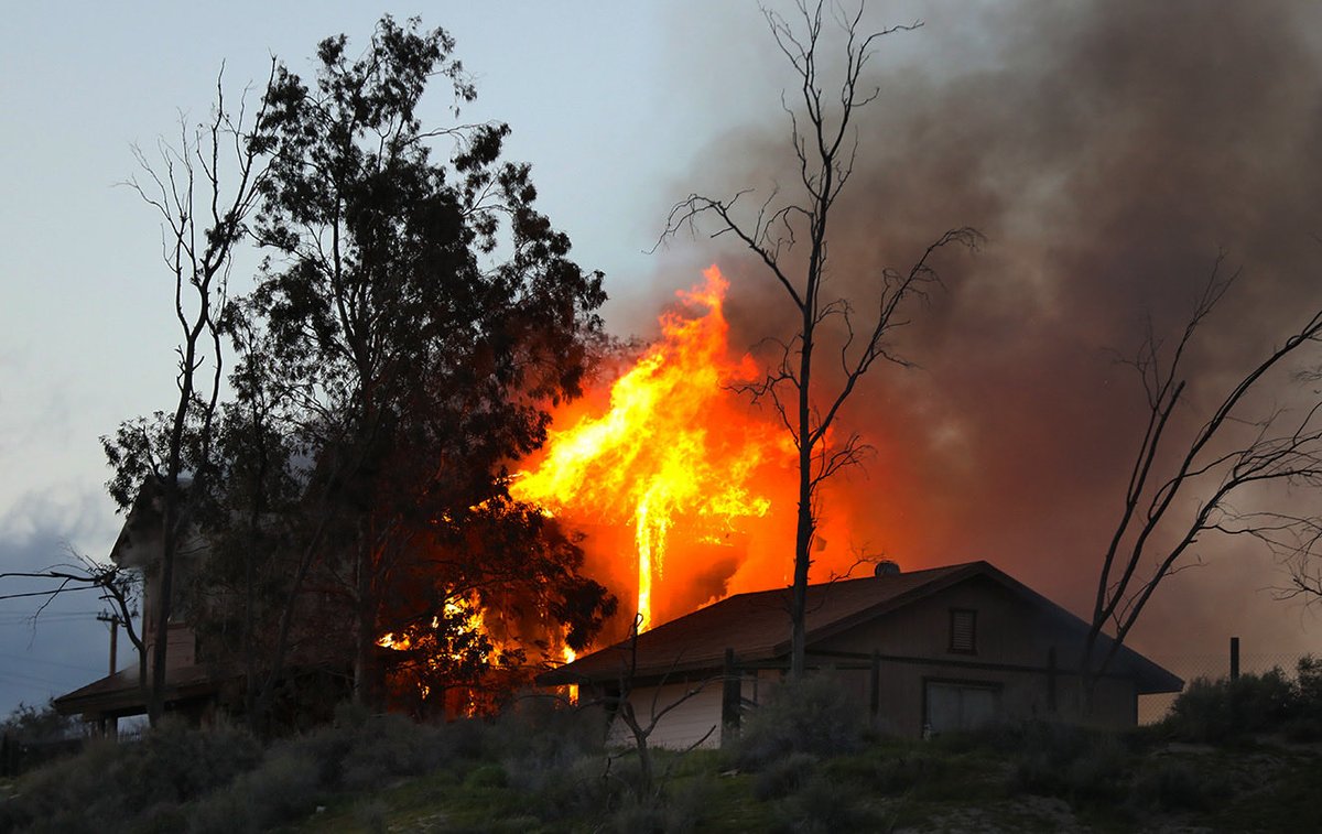 Flames consume two-story house near Highway 119 and Golf Course Road Saturday evening