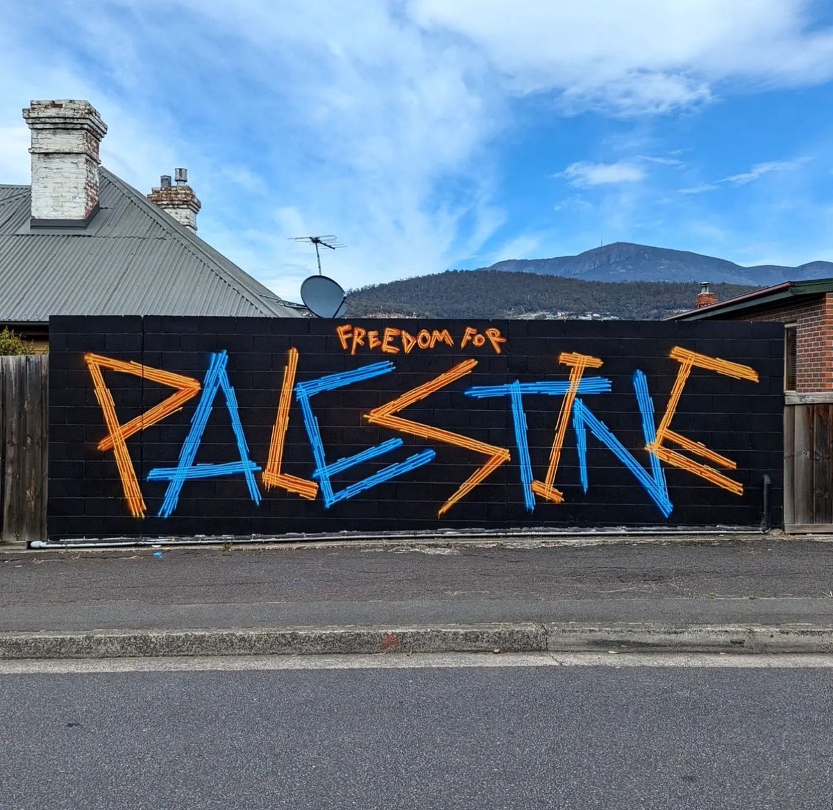 omarsakrpoet's tweet photo. City of Hobart has removed a “Freedom for Palestine” mural by Jonny Scholes, painted on a private wall - with the owner’s permission - due to its “political messaging.” No more political art, folks. https://t.co/dzAUexPvbh