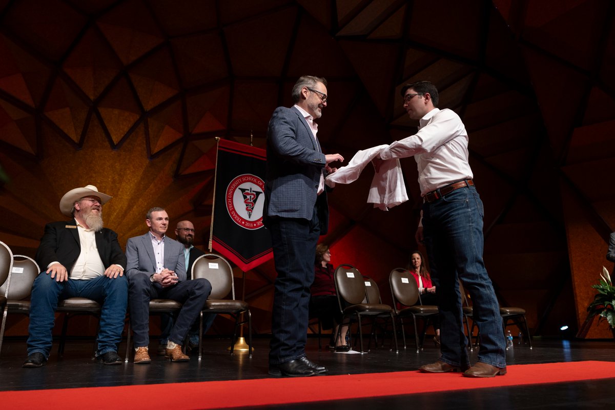 TTUVetMed's tweet photo. Our first-ever White Coat Ceremony was a success.

We celebrated our 62 pioneering RaiderVets transitioning from pre-clinical training to their clinical year by placing a white coat on each student.

Read more ➡️ https://t.co/gkJmuKYMBI

Guns Up RaiderVet Nation!
#TTUVetMed https://t.co/synaY2MpXm