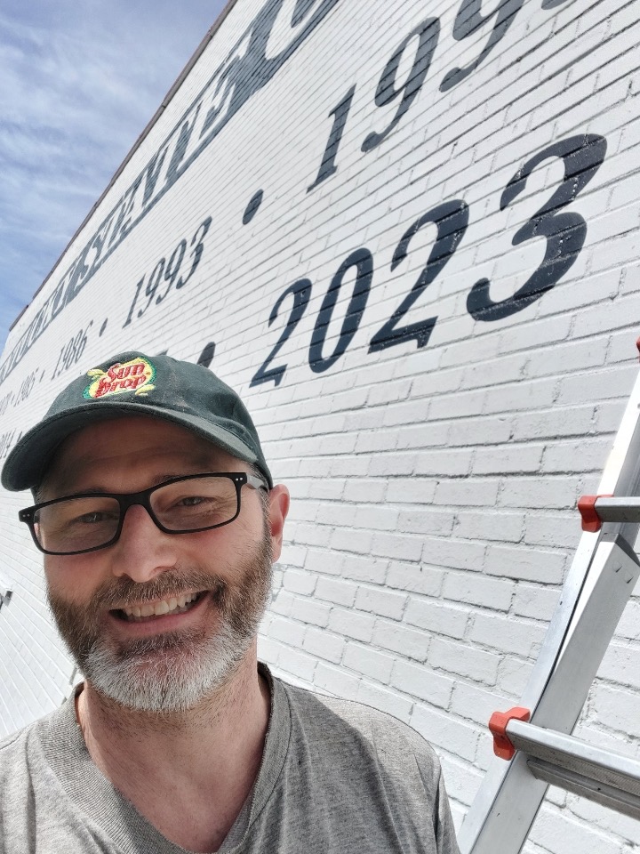 #13 has been added to CFSB War Memorial Stadium.  Local artist Ronnie Moyers has added "2023" to the list of years the Cardinals won a football state championship.  
His work on the stadium wall is not yet complete.  He will be restoring the painted banner this summer.