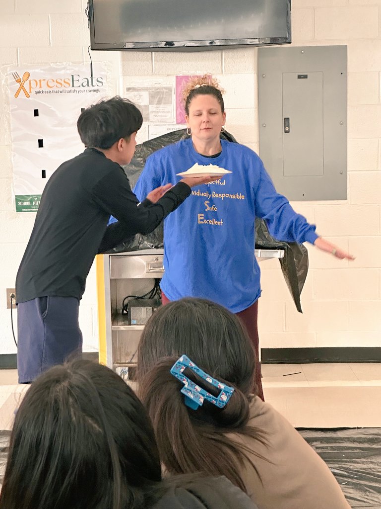 ErskineWilsonAP's tweet photo. On this week's episode of PBIS at EPMS, it was PI Day so why not take PIES to the face! Shout out to Principal Smith, AA @MrJamesTongue, Mr. Tyus, and Mr. Pickering for taking a few pies for the team! #PiDay #pbisrewards #studentrewards #everydayweRISE @EPMSParentLisa https://t.co/0zgGhBtxwe