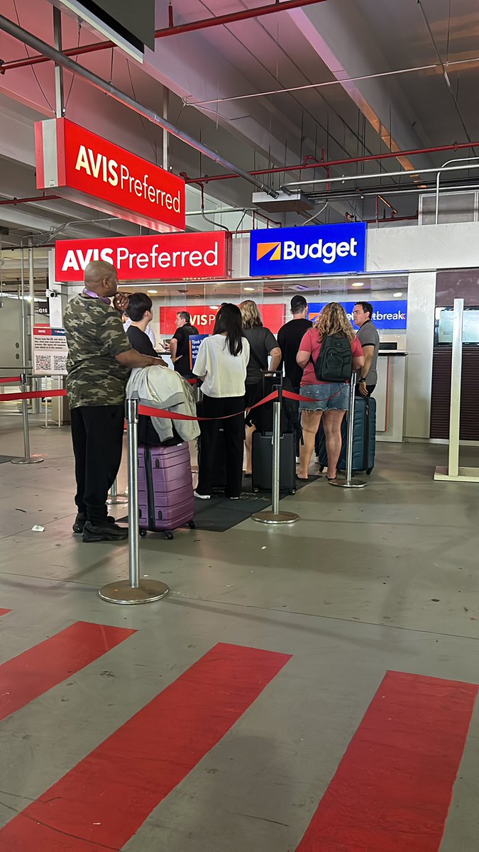 emckain's tweet photo. @Budget The current situation at Miami airport.  Worker just left the booth with everyone waiting. https://t.co/R8DOtd3EJ3