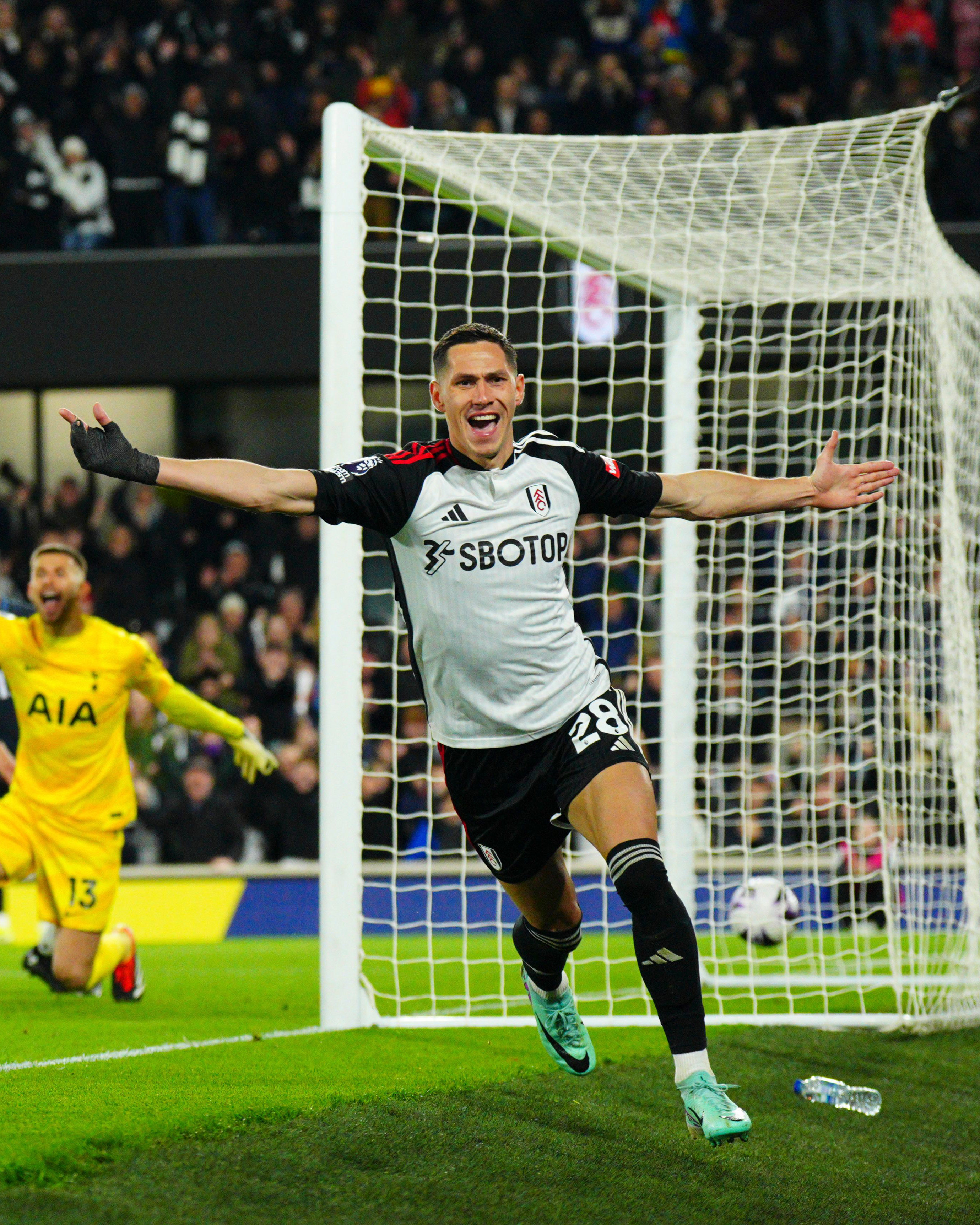 Saša Lukić celebrates his goal against Tottenham.