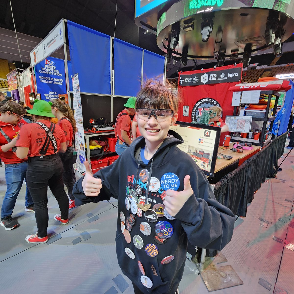 dotsciguy's tweet photo. The boys and I stopped at the FRC Wisconsin Regional, our annual tradition, held at the Panther Arena. Wyn explored the pits and proudly adorned himself with team pins from the majority of the 54 competing teams today.

#omgrobots #hardestfunever #FIRSTWISCONSIN https://t.co/kXH338iLTi