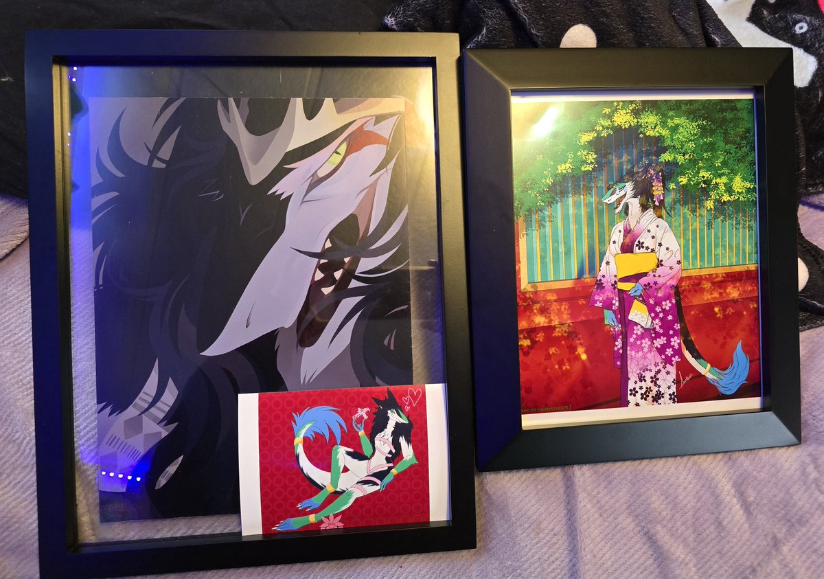 Went wild at Walmart, got a frame for the print I bought from @/mowamowafluff, after I printed off the AMAZING N LOVELY ART OF MY SERGAL CYRYLL I WON FROM @aranath025!!! Then, a mini print of my own art

My house is gonna be 100x prettier now 💚💙💚💙💚

#furry #Vilous #sergal