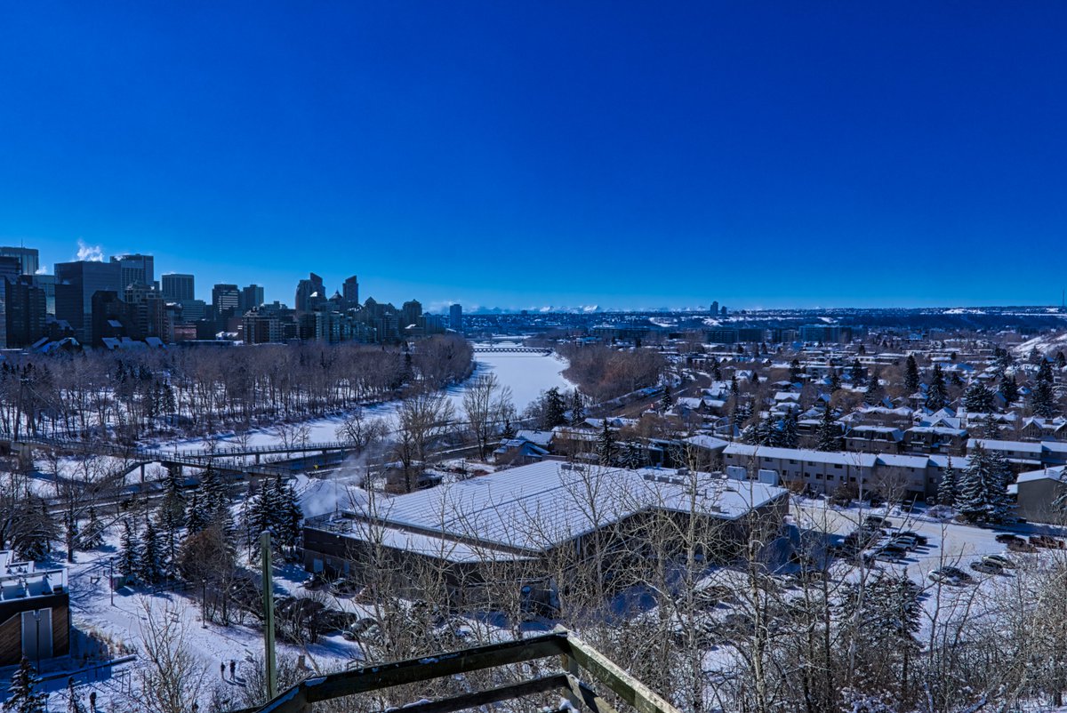 The Bow River and Peace Bridge looking west from McHugh Bluff in the winter.  This is an HDR edit.  #calgary #alberta #mchughbluff #bowriver #peacebridge #nature #landscapes #winter #winterphotos #snow #ice #hdr #hdredit #aurorahdr