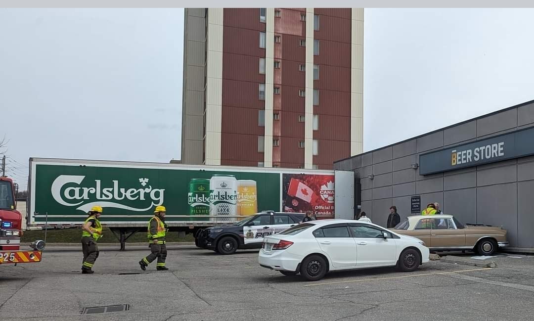 Elizabeth May drove an old car to a beerstore in Waterloo.