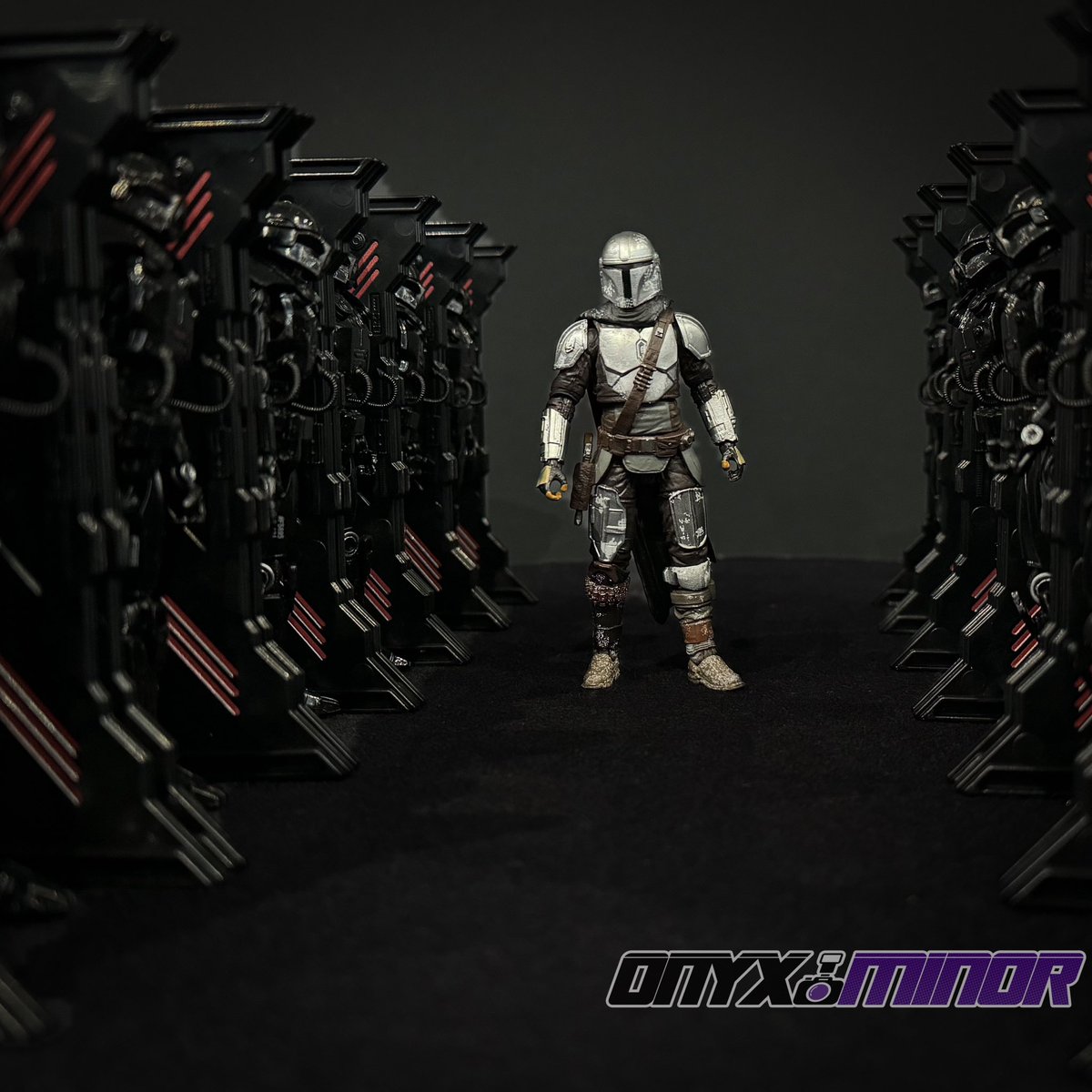 onyxminor's tweet photo. Ok, wrong version of Din Djarin (I’m missing a box of TVC figures right now with no time to find them) but I wanted to have fun with all these Dark Troopers I got on sale recently. https://t.co/fgCixQTvHO