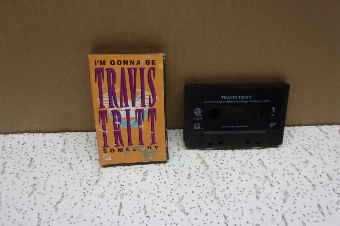 Drop the first album you ever bought. Mine wasn’t an album. It was a cassette single of @Travistritt’s I’M GONNA BE SOMEBODY. Found a photo online of someone else’s copy. I wore mine out. God bless 90’s country.