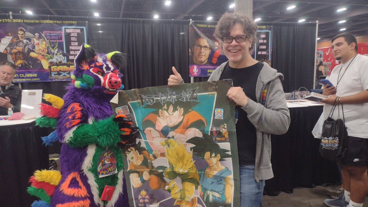 MajoraJackal's tweet photo. Additionally I got to meet voice actors for 2 of my fav childhood characters. Been waiting 20 years to meet Sean Schemmel, and he had signed a poster my mom made for me just as long ago. Both he and Quinton Flynn were absolute gems, 10/10 experiences https://t.co/iqKZCSiKhH